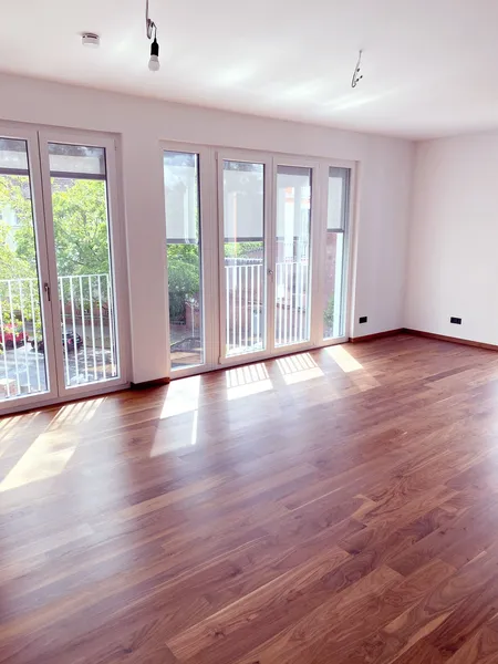 Sonnige 3-Zimmer Wohnung im Neubau mit Aufzug Balkon 2 Bädern und EBK 5 Min vom Hauptbahnhof mit TG — photo 1